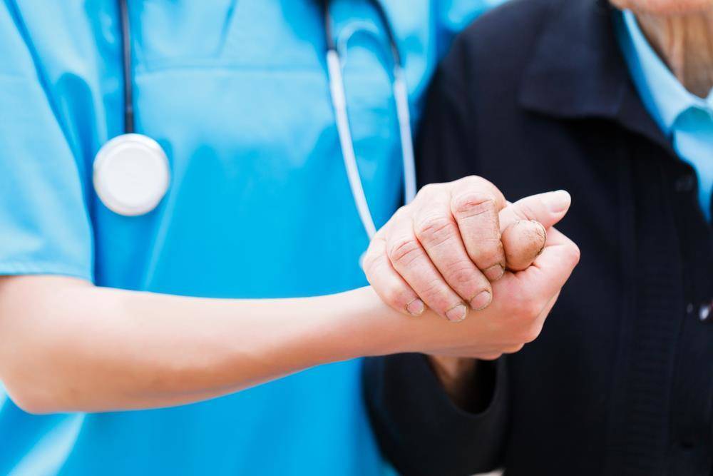 Nurse Holding Hands